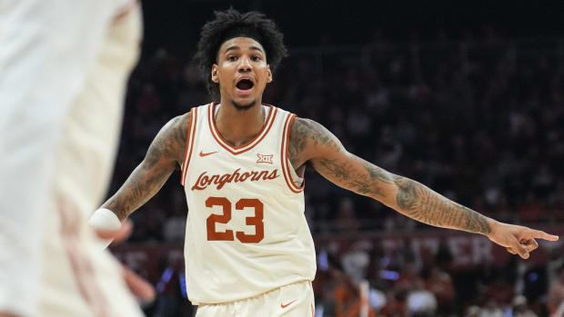 Texas Longhorns forward Dillon Mitchell (23) yells instructions at his teammates as the Longhorns play Kansas State at The Moody Center on Monday, Feb. 19, 2024.  